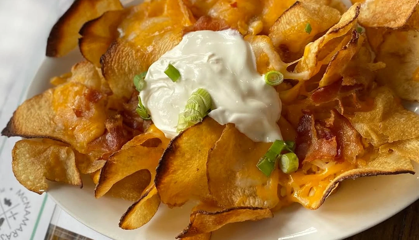 Loaded potato chips with sour cream and scallions at McNamara's Pub & Restaurant, Irish pub near Alexandria VA