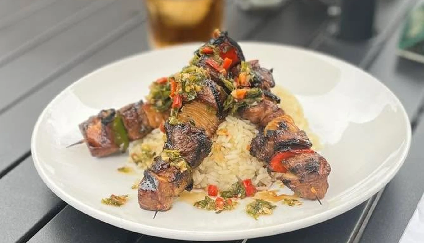 Grilled steak skewers over rice at McNamara's Pub & Restaurant, Irish pub near Arlington Ridge VA