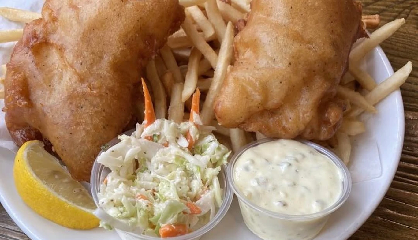 Fish and chips with coleslaw, lemon and tartar sauce at McNamara's Pub & Restaurant, Irish pub near Arlington Ridge VA