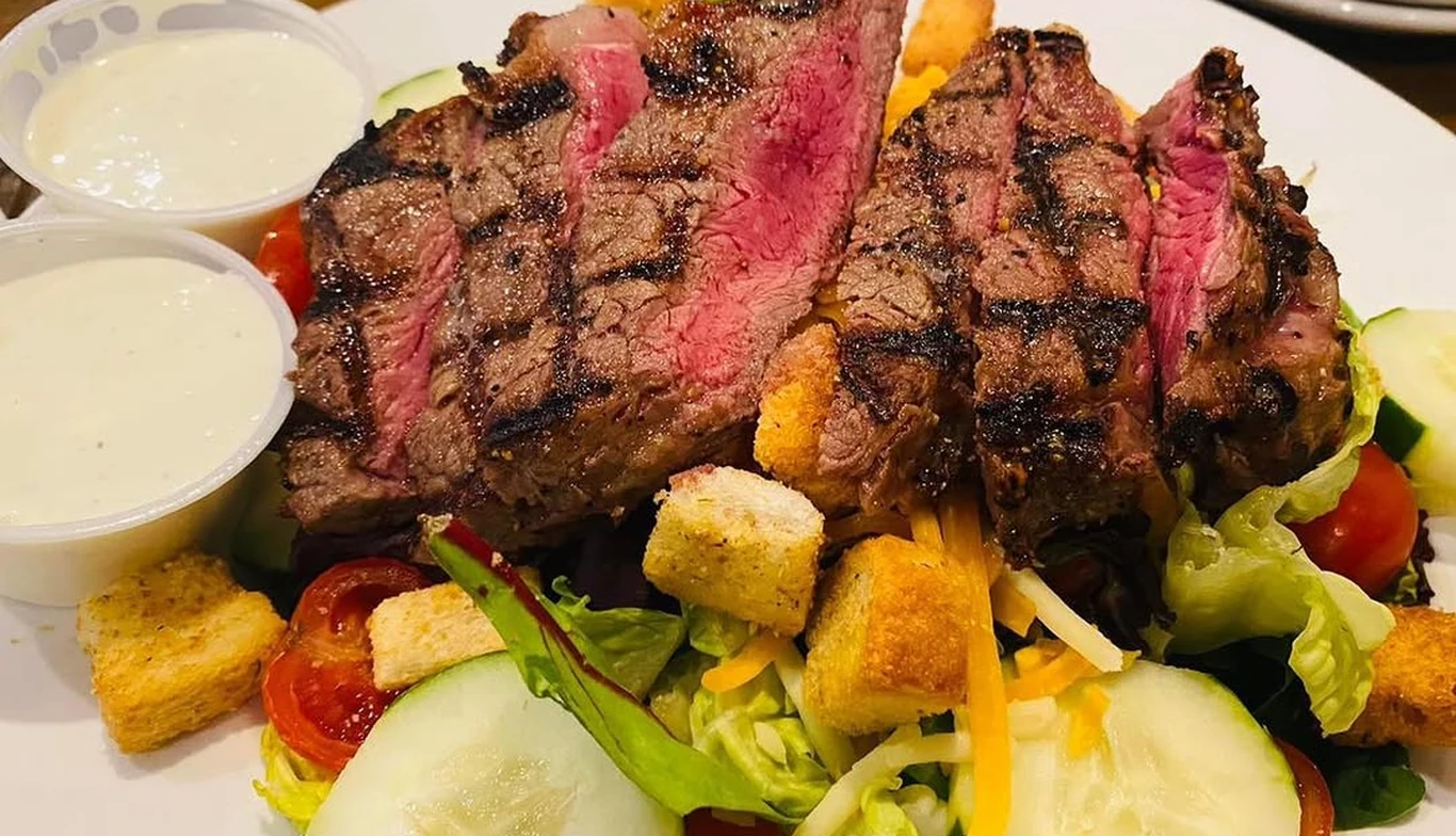 Sliced steak salad at McNamara's Pub & Restaurant, Irish pub near Aurora Highlands VA