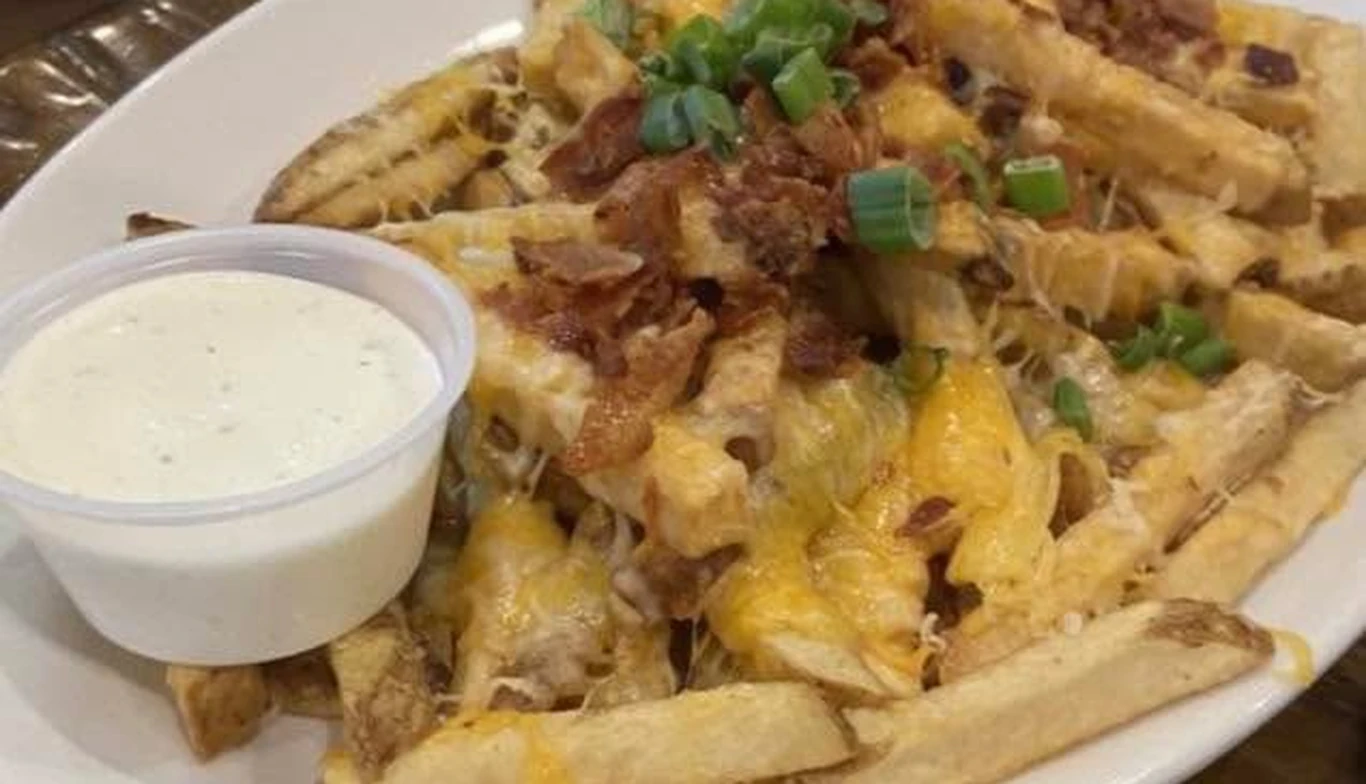 Loaded fries with cheese, bacon and ranch at McNamara's Pub & Restaurant, Irish pub near Court House VA