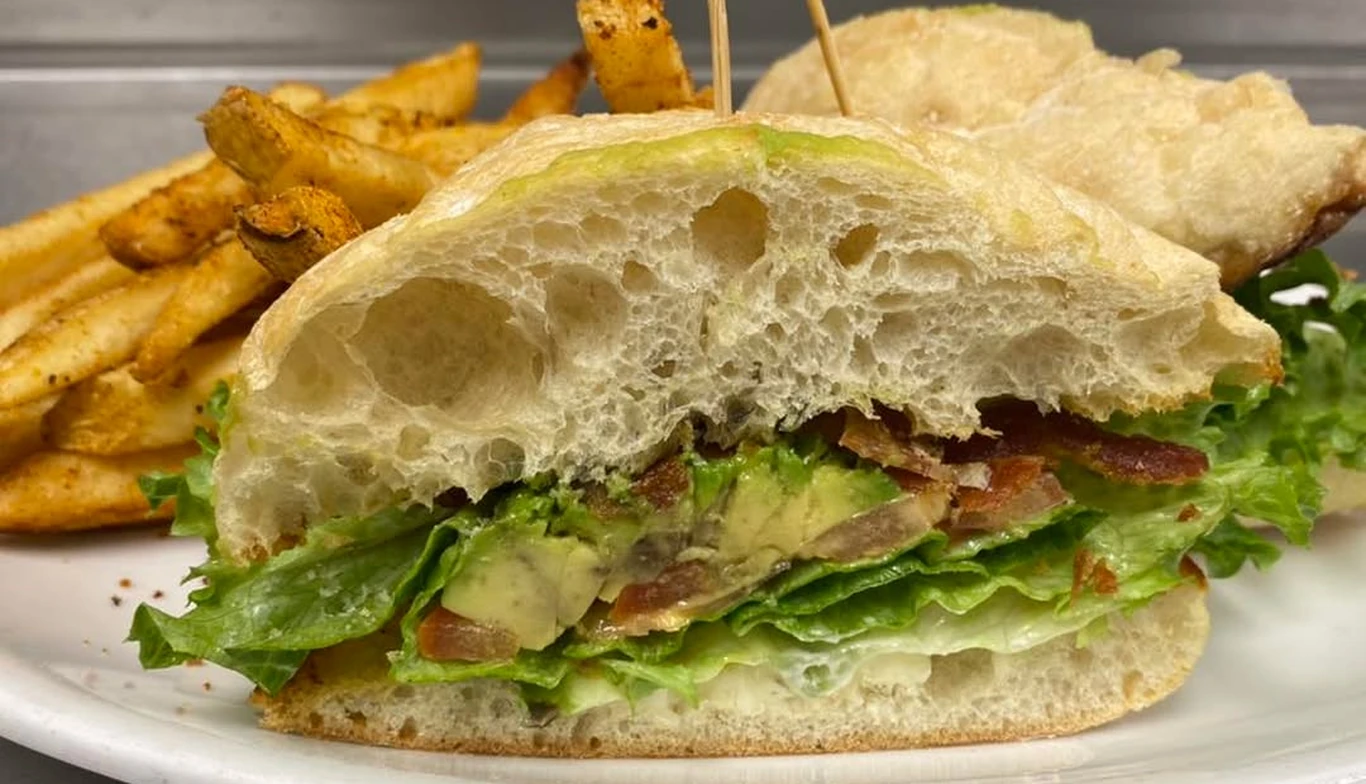 Chicken sandwich on ciabatta with lettuce and tomato at McNamara's Pub & Restaurant, Irish pub near Court House VA