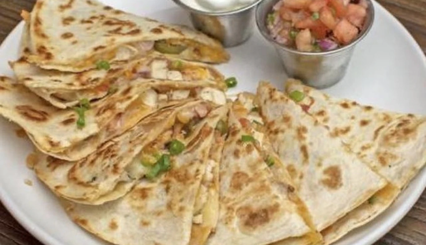 Quesadilla wedges with pico de gallo and sour cream at McNamara's Pub & Restaurant, Irish pub near Court House VA