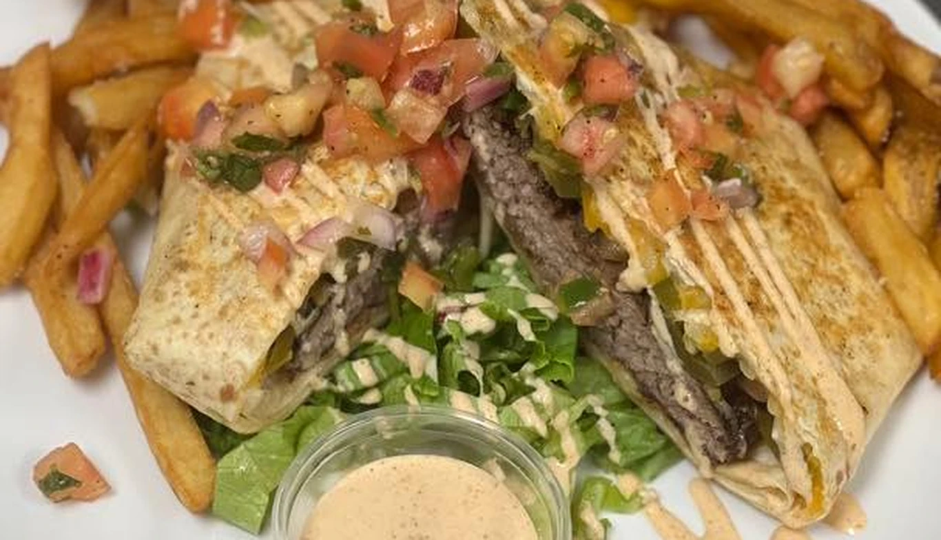 Steak salad wrap with fries at McNamara's Pub & Restaurant, Irish pub near Crystal City VA