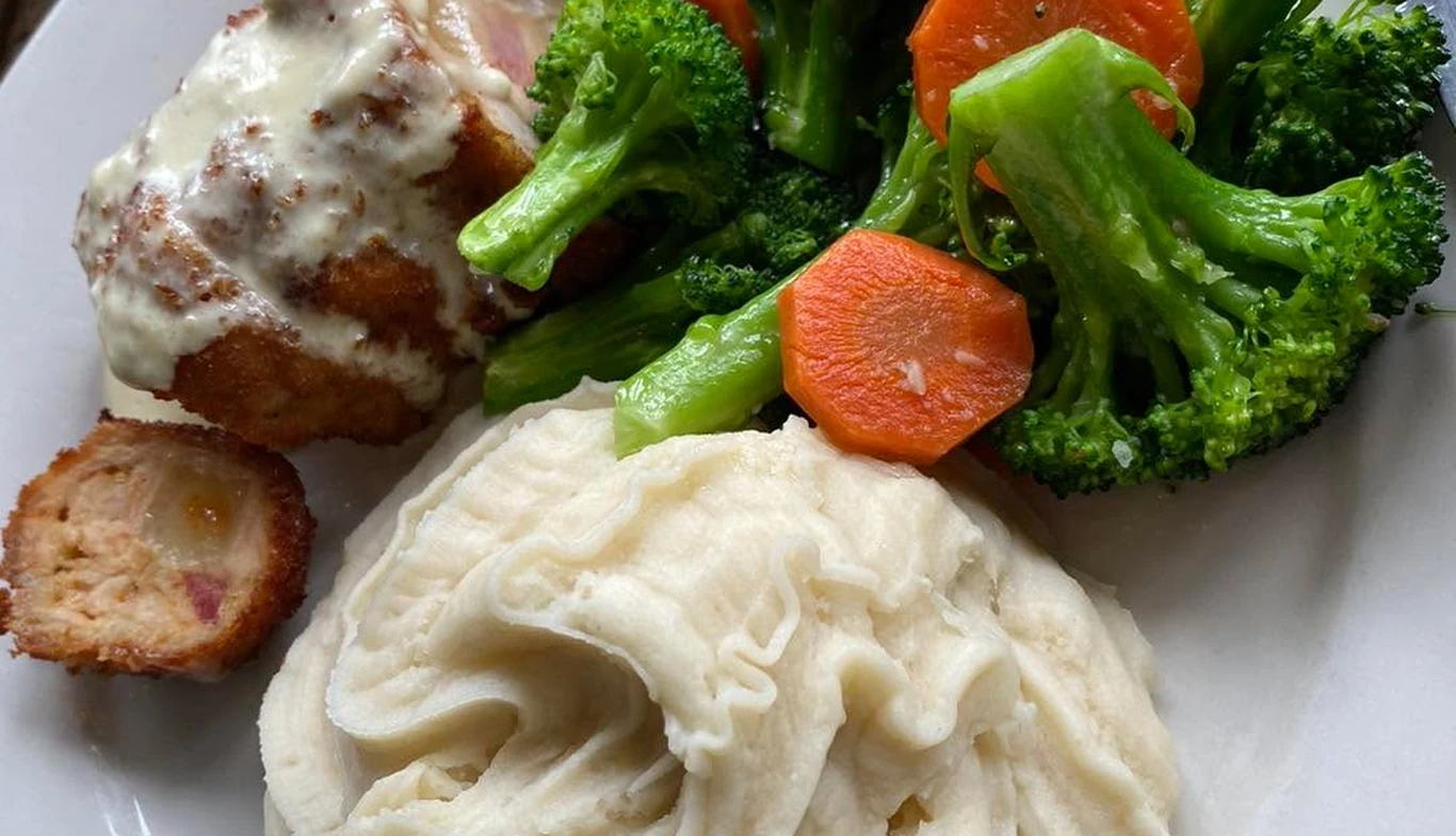 Bangers and mash with broccoli and carrots at McNamara's Pub & Restaurant, Irish pub near Crystal City VA