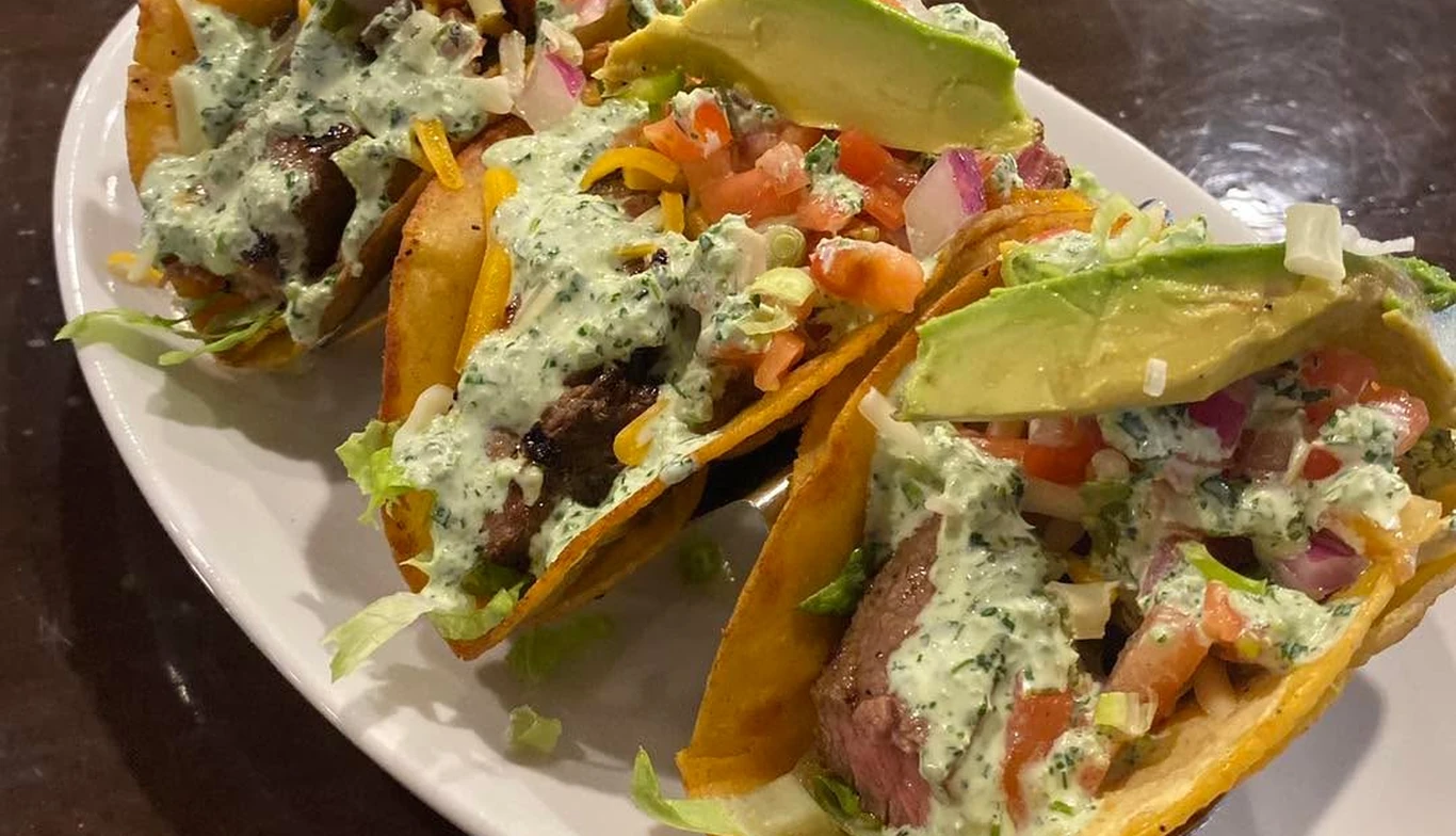 Tacos with avocado and crema at McNamara's Pub & Restaurant, Irish pub near Del Ray VA
