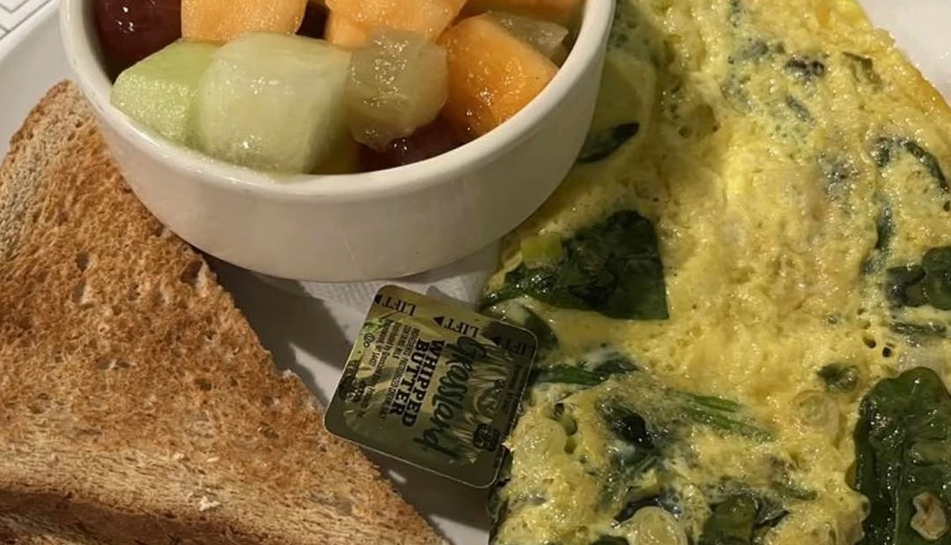 Breakfast plate with spinach omelette, toast and fruit cup at McNamara's Pub & Restaurant, Irish pub near Foggy Bottom DC