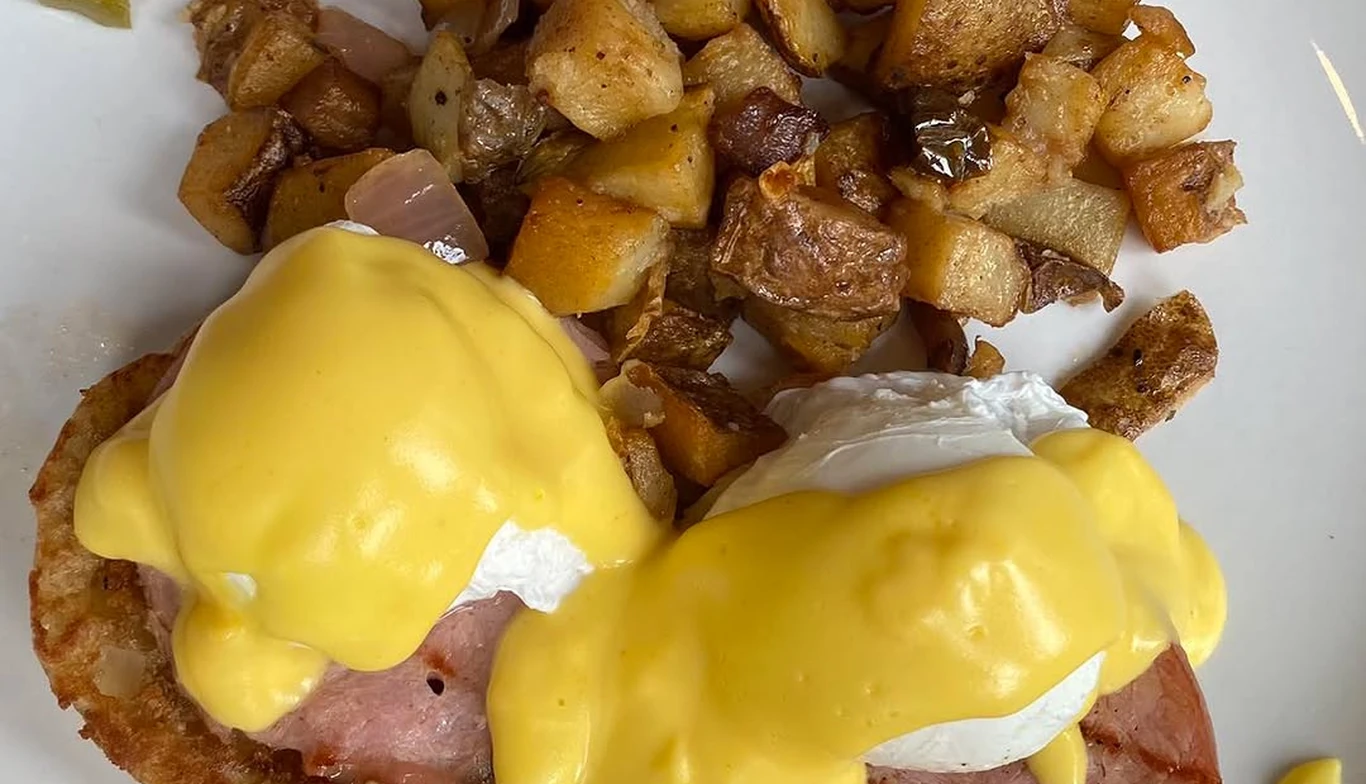 Eggs Benedict with home fries at McNamara's Pub & Restaurant, Irish pub near Foggy Bottom DC